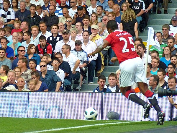 Valencia taking a corner kick in the 2–2 draw away to Fulham on 22 August 2010