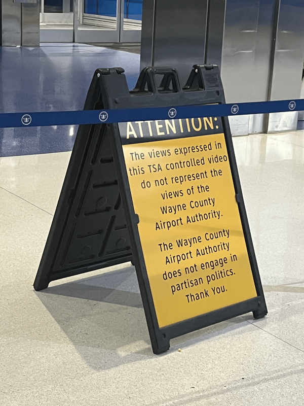 Detroit Metro Airport sign regarding the Kristi Noem video