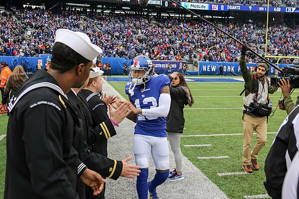 Beckham greeting US military personnel before the start of a game in 2018